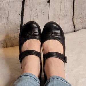 Well worn maryjane shoes leather used loved